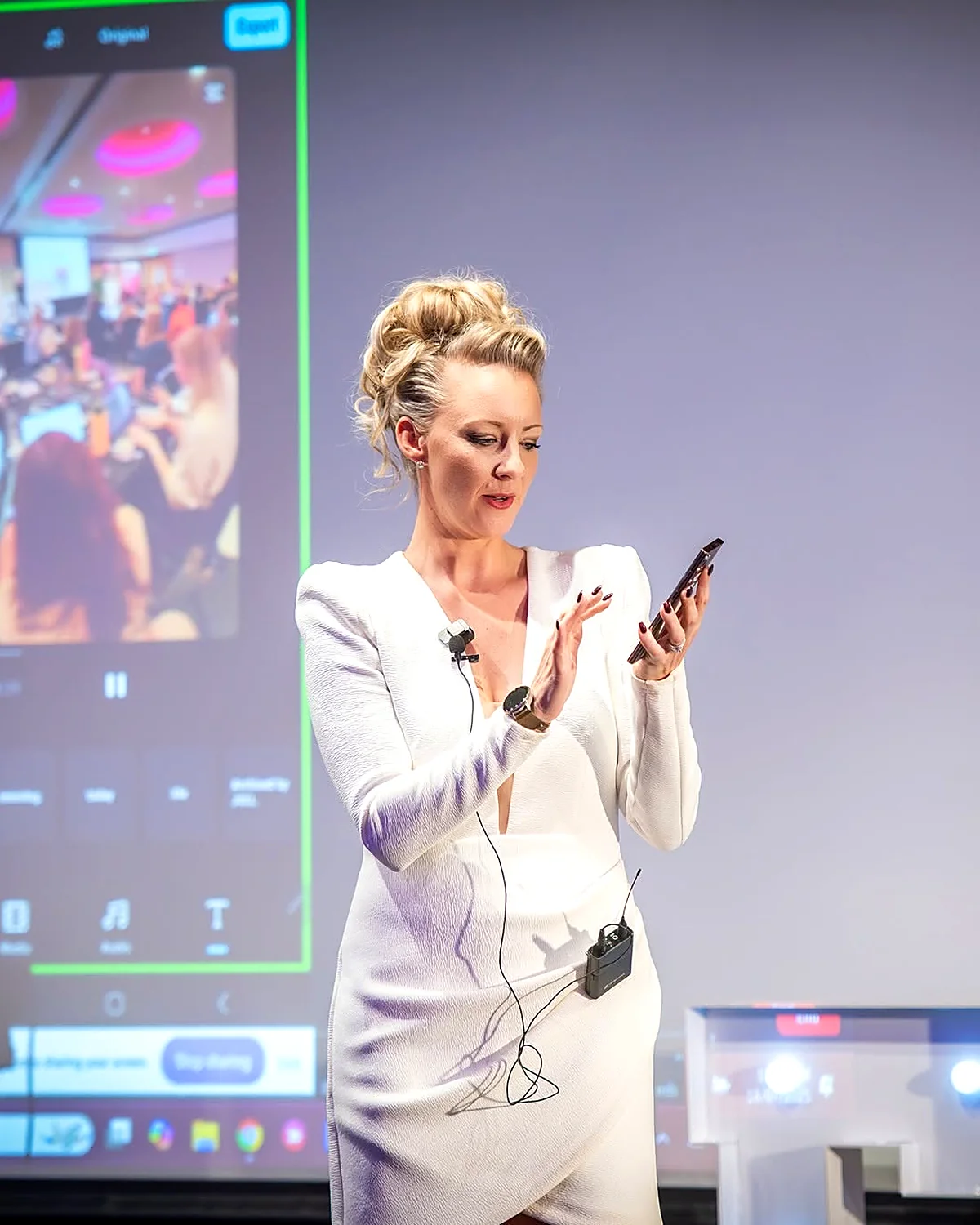 Sarah Cordiner demonstrating an app live on stage