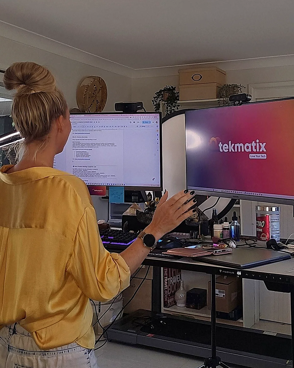 Sarah Cordiner at her desk showing the Tekmatix platform on screen