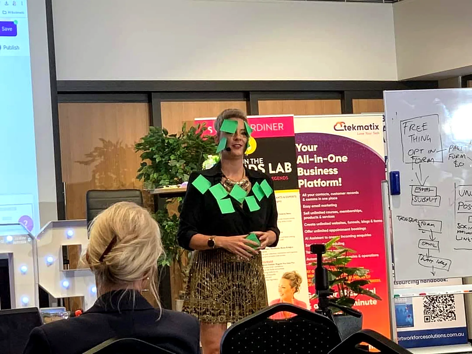 Sarah Cordiner covered in sticky notes while teaching a live Legends Lab workshop